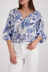Blouse with floral pattern