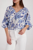 Blouse with floral pattern