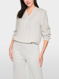 Loose-fitting blouse with V-neck