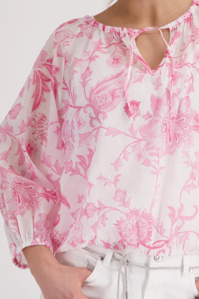 Blouse with floral pattern