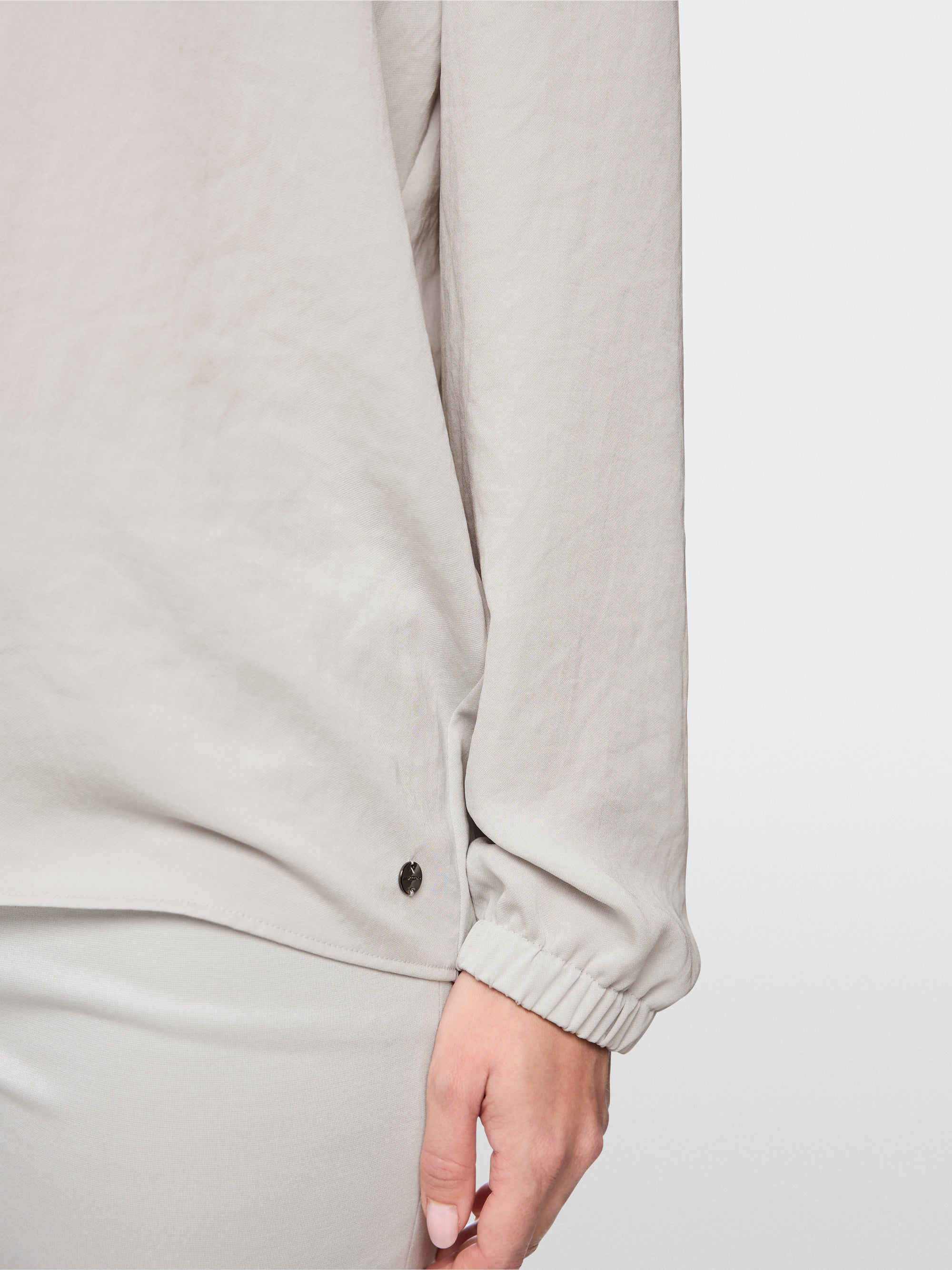 Loose-fitting blouse with V-neck