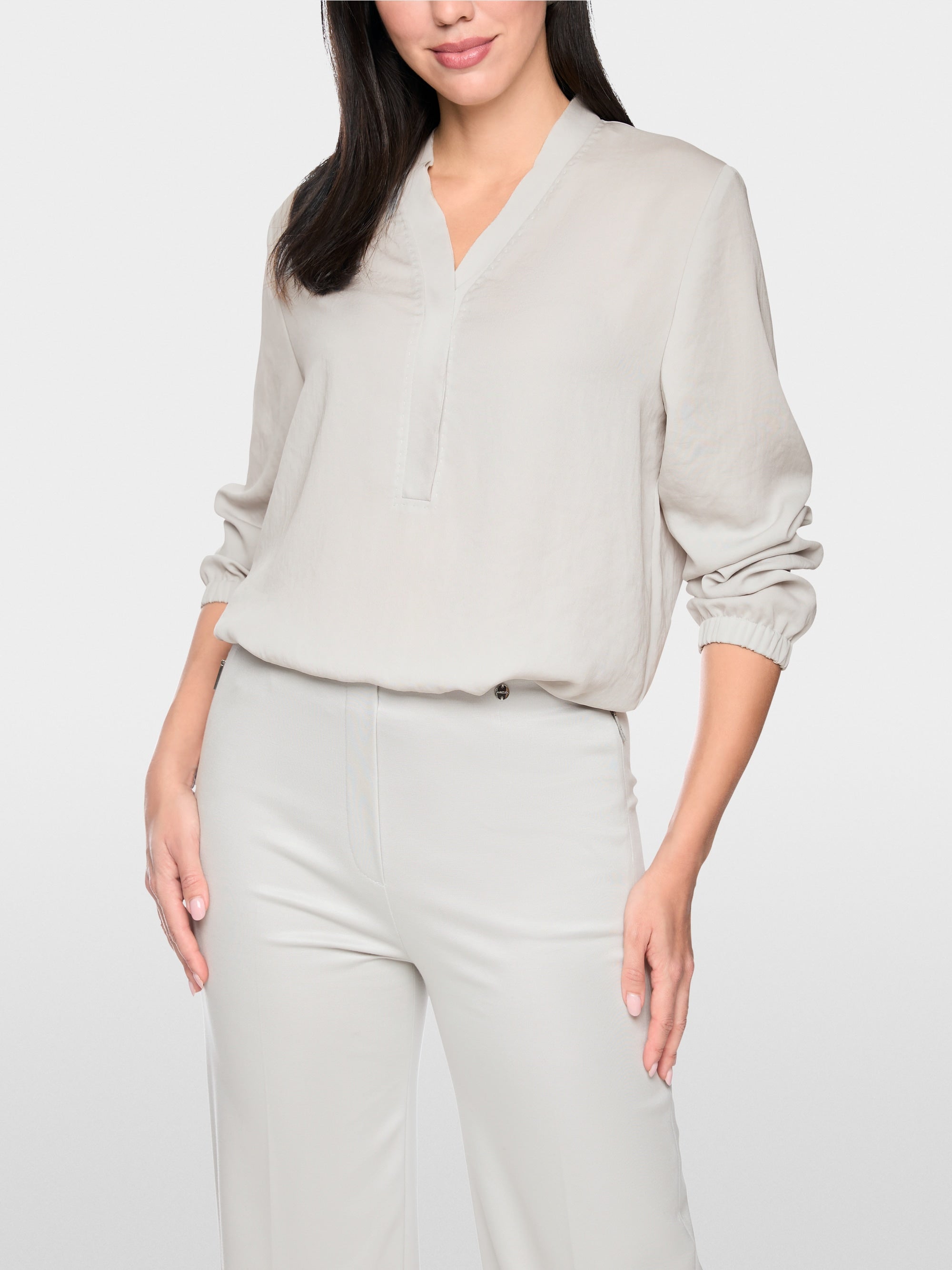 Loose-fitting blouse with V-neck